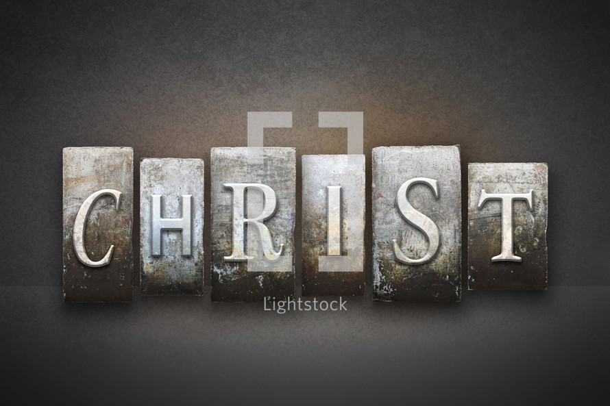 Stone tiles spelling the word CHRIST.