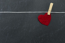 red heart on a clothesline 