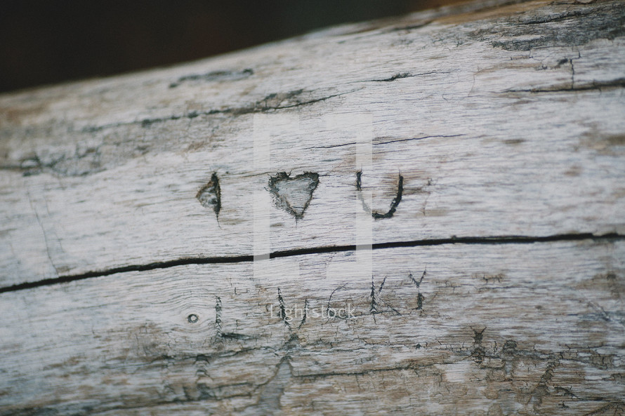 I heart you carved in  wood