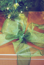 sparkly green bow on gift