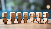 Wooden people with smiley face on wooden table. Business concept