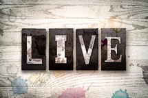word live on wood background 