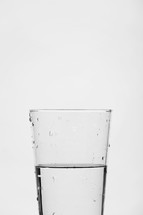 glass half full of water.