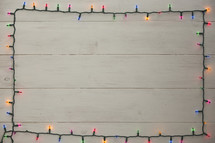 colored Christmas lights border.
