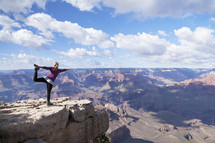yoga at the top of a canyon 