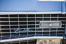 Grill of a Cadillac classic car