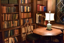 desk and lamp in a library
