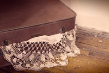 lace doily in a suitcase 
