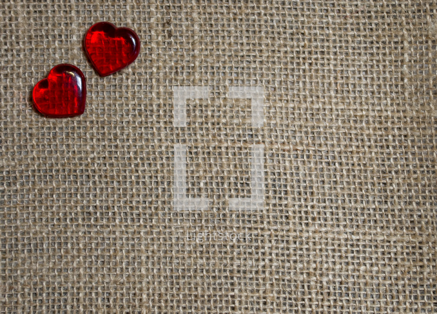 red hearts on burlap 