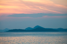 mountainous islands at sunset