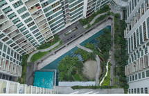 Aerial shot of landscape area outside apartment blocks