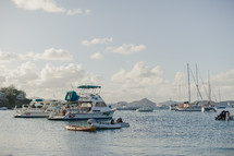 boats anchored near shore  
