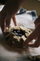 a woman baking pastries 