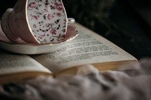 tea cup and open book 