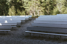 rows of benches outdoors 