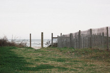 fence near a sea shore 