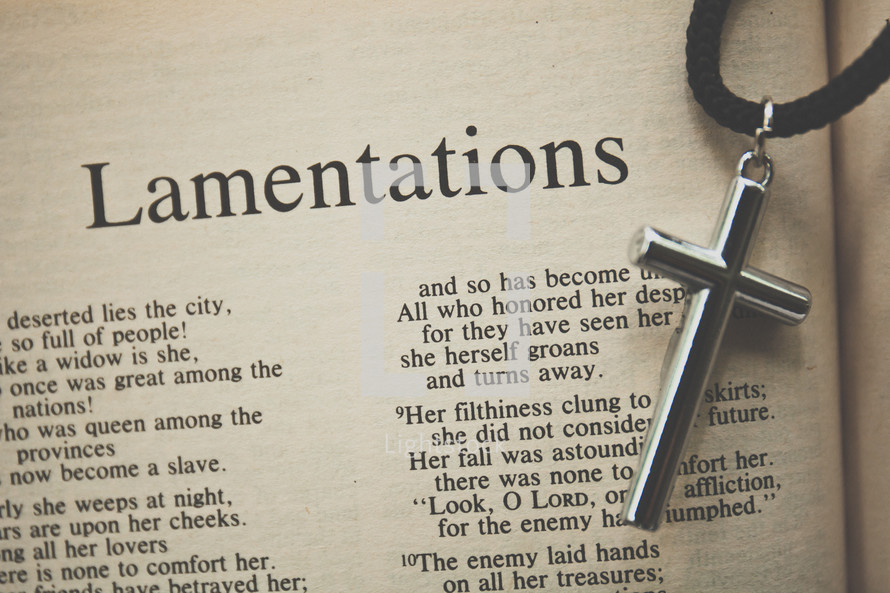 Lamentations and a cross necklace 