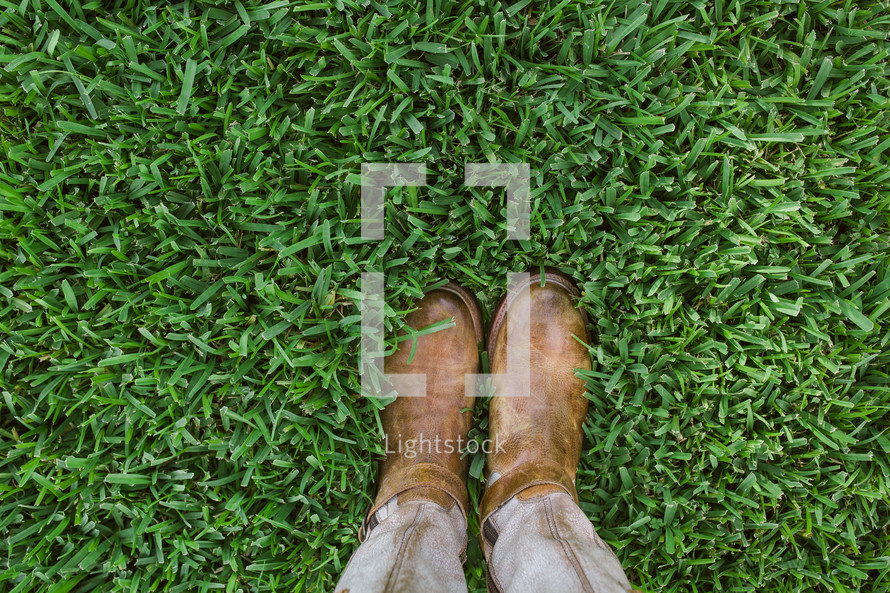 boots in the grass 