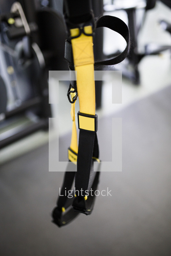 TRX fitness straps at a gym