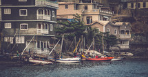 boats on the shore of a fishing village 