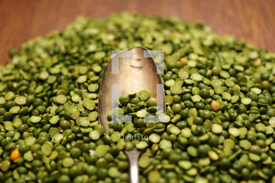 dried peas on an old spoon