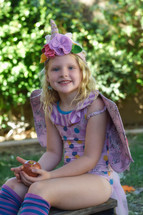girl child in a uniform costume 