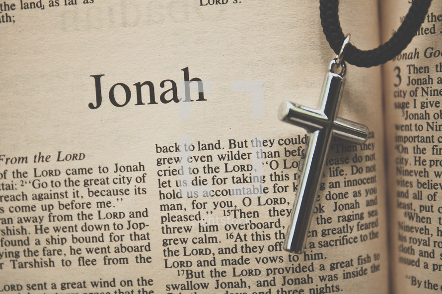 Jonah and a cross necklace 