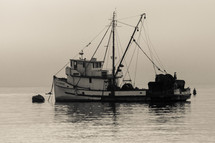 a shrimp boat on the water 