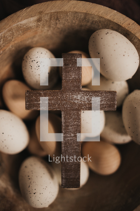 bowl with speckled eggs and cross 