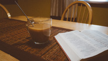 Chai latte and an open Bible. 