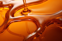 Close-up view of flowing liquid caramel texture