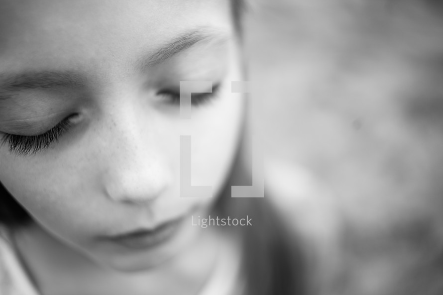 young girl with closed eyes 