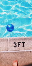 ball floating in a pool 