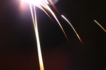playing with sparklers on the 4th of july