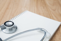 stethoscope on a notebook 