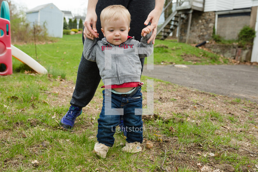 toddler boy learning to walk 