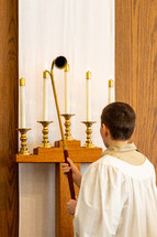 acolyte lighting candles