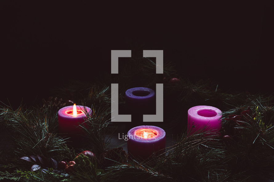 Rustic advent wreath with two candles lit