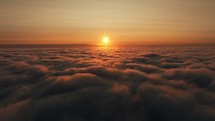 Scenic sunset above heavenly clouds