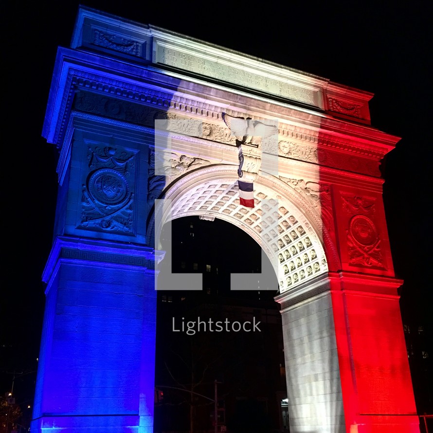 Arc de triomphe in blue, red, and white light