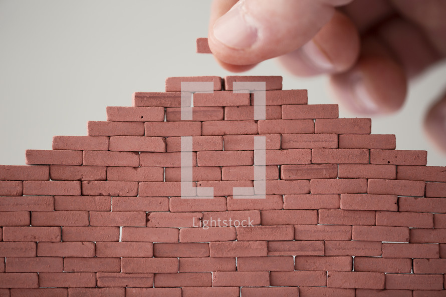 building a wall of bricks 