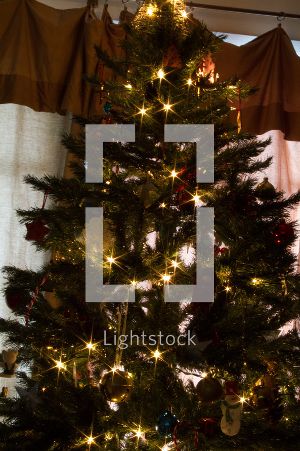 ornaments and lights on a Christmas tree