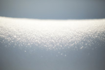 a close up of a beautiful blanket of snow