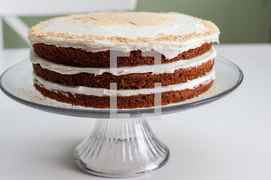 carrot cake on a cake stand 