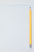sharpened pencil on notebook paper 