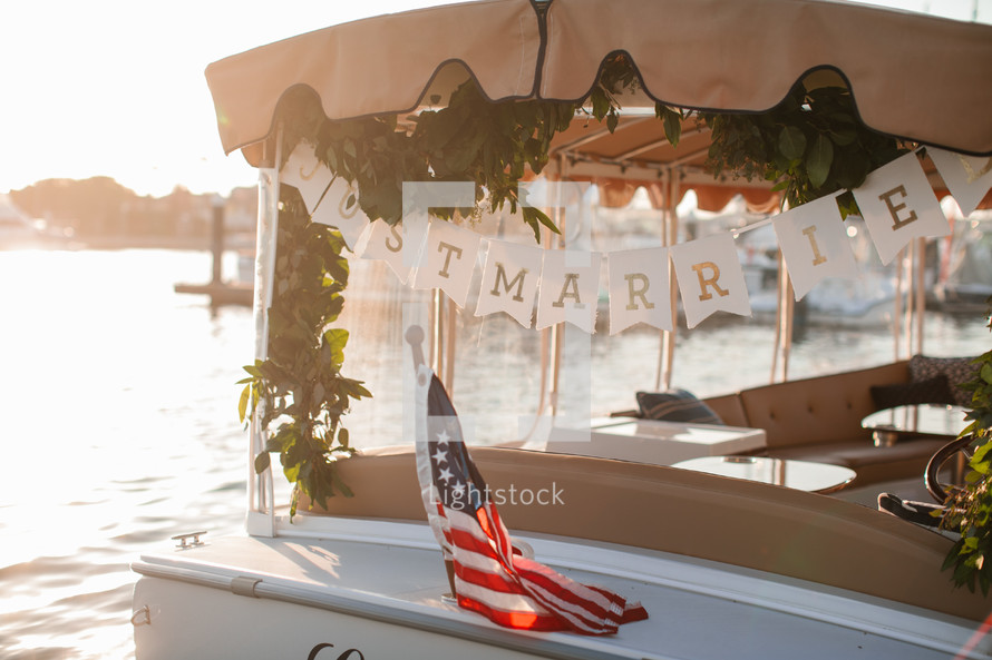 just married on the back of a boat 