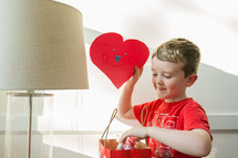 a child making a valentines gift 