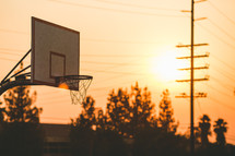 basketball goal at sunset 