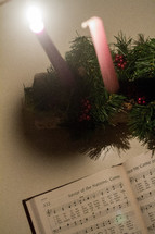 Advent wreath and hymnal 