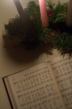 hymnal and Advent wreath 
